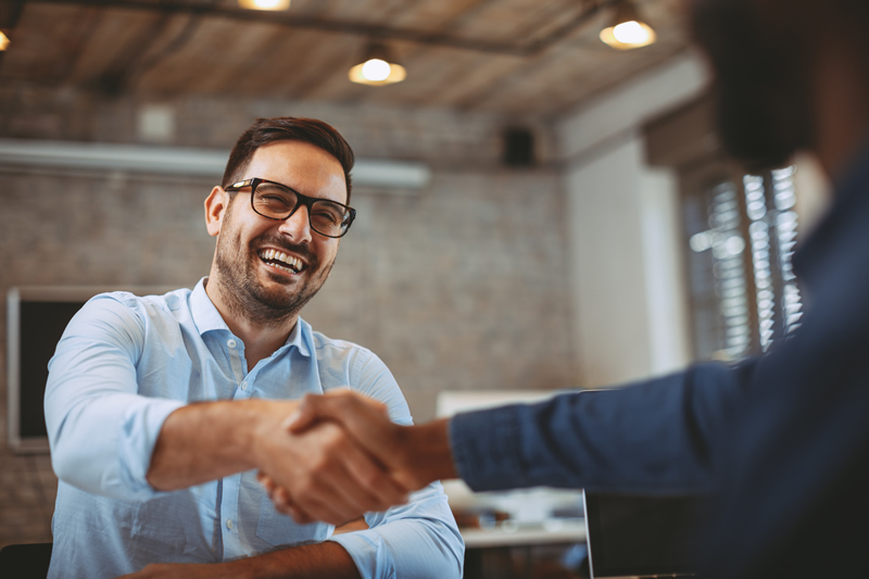 Two businessmen shaking hands