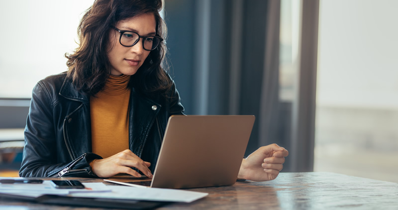 A business woman with a laptop